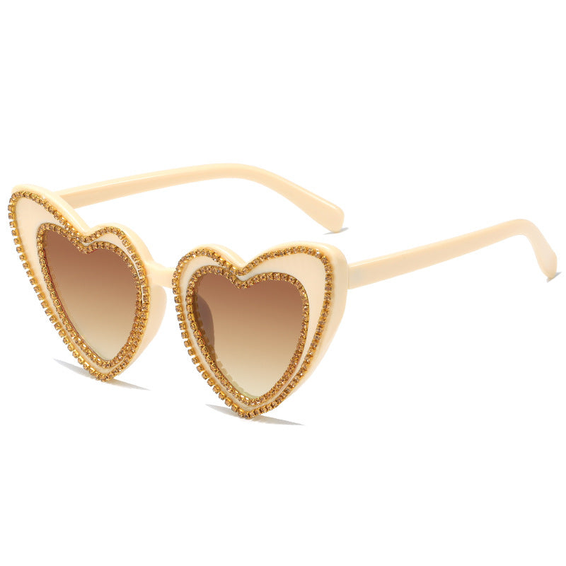 Damen Herzförmige Sonnenbrille mit Glitzerakzenten Karnz