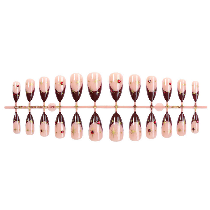 Kunstnagelset mit funkelnden Sternen- und elegantem Marmor-Effekt Karnz
