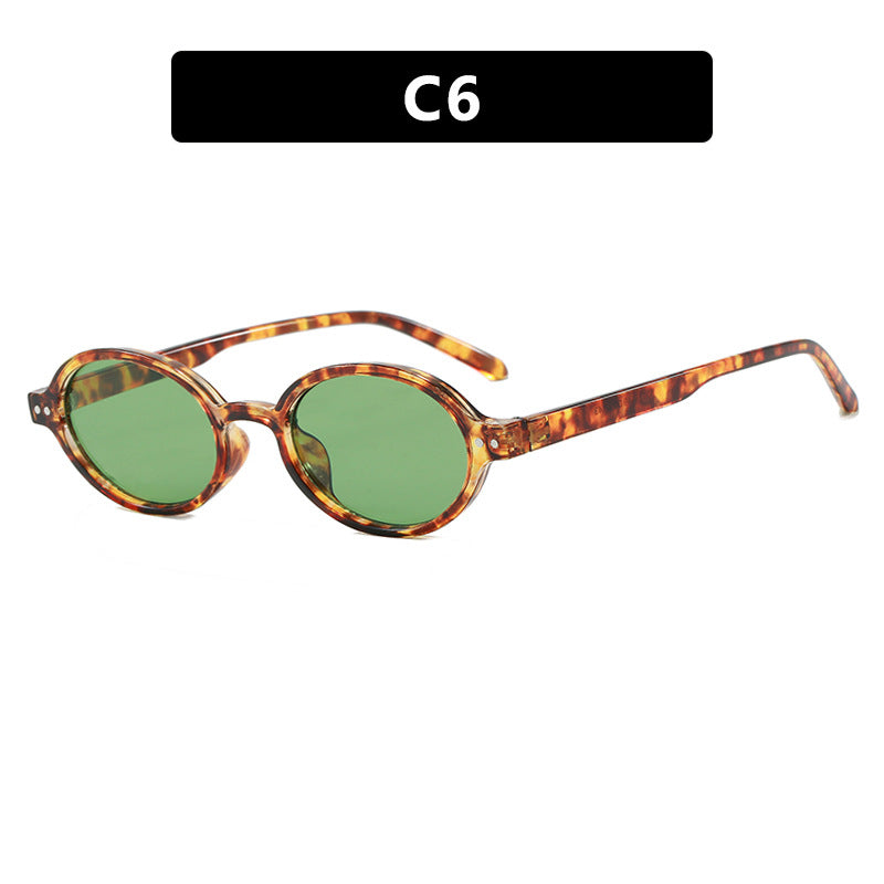 Damen modische ovalförmige Sonnenbrille mit ausgefallenem Rahmen Karnz
