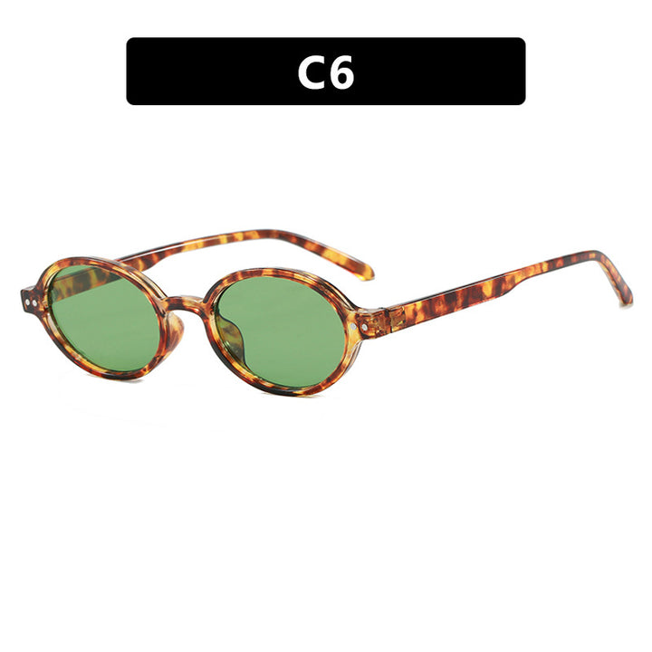Damen modische ovalförmige Sonnenbrille mit ausgefallenem Rahmen Karnz