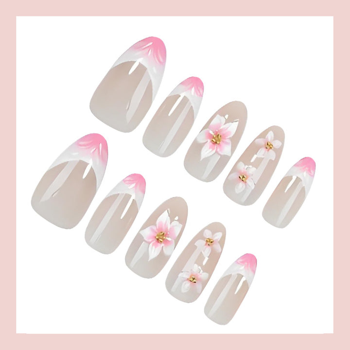 Kunstnagelset mit romantischen Blumen- und Ombre-Effekten Karnz
