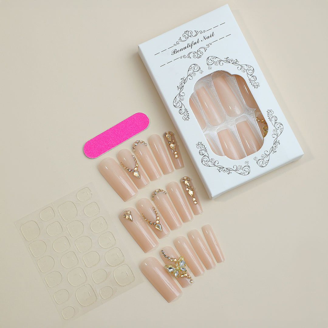 Dekoratives Press-On-Nagelset mit Strassverzierungen Karnz