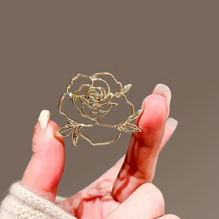 Elegante Rosé Brosche Karnz