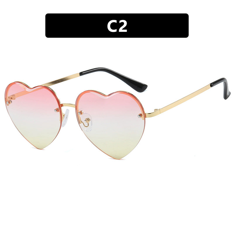 Damen Herzförmige Sonnenbrille mit verspiegelten Gläsern und modischem Metallrahmen Karnz