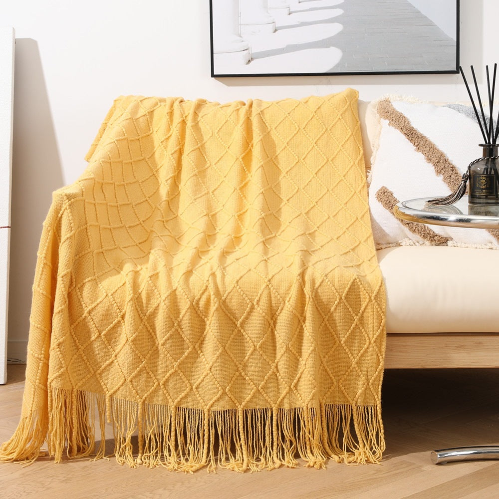 Gemütliche strukturierte gestrickte Wurfdecke