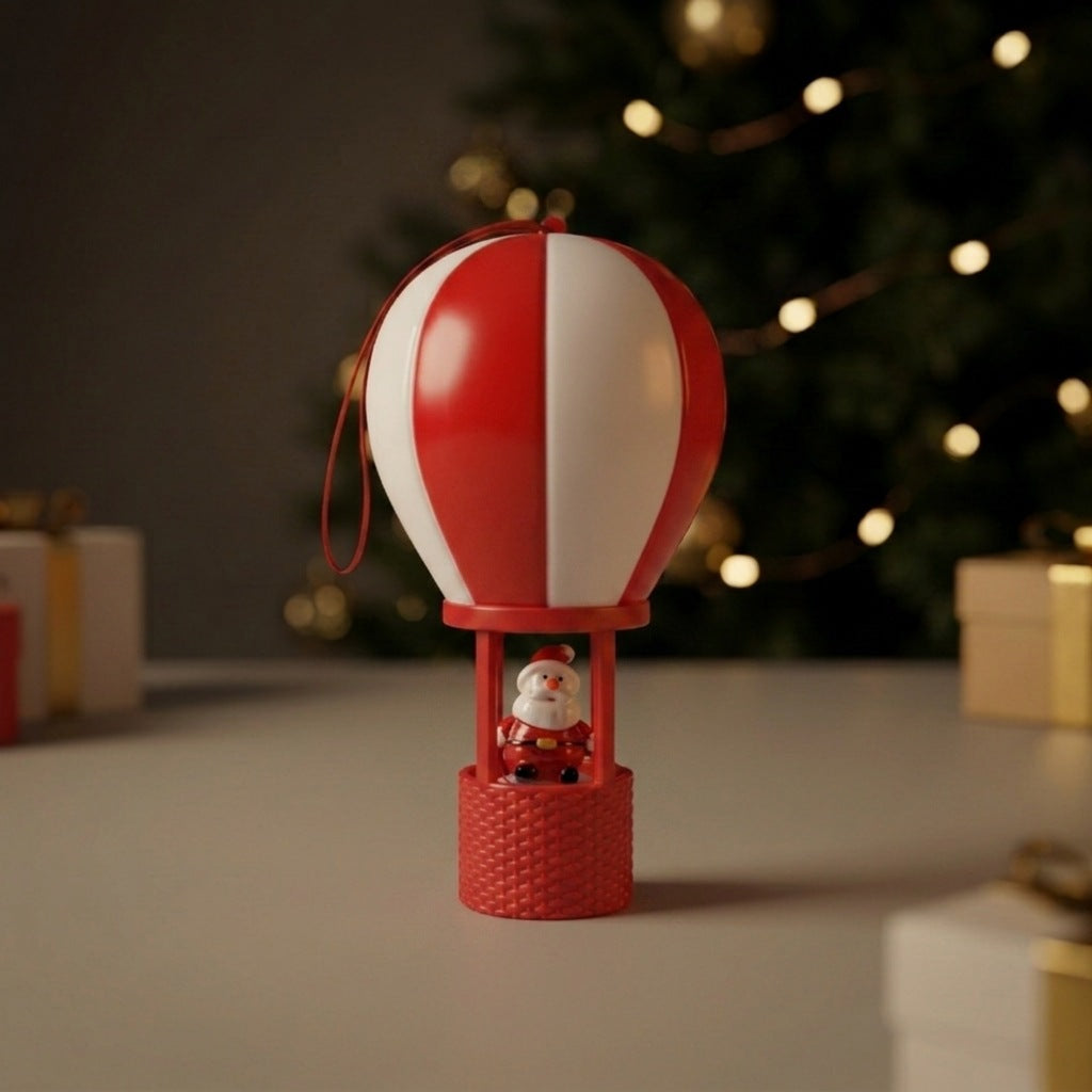 Weihnachtsmann Dekofigur im Heißluftballon Karnz