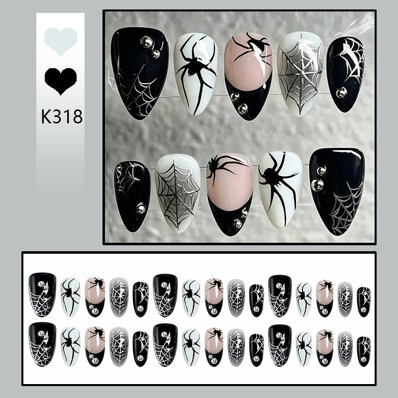 Kreatives Kunstnagelset mit Halloween-Spinnen-Design Karnz