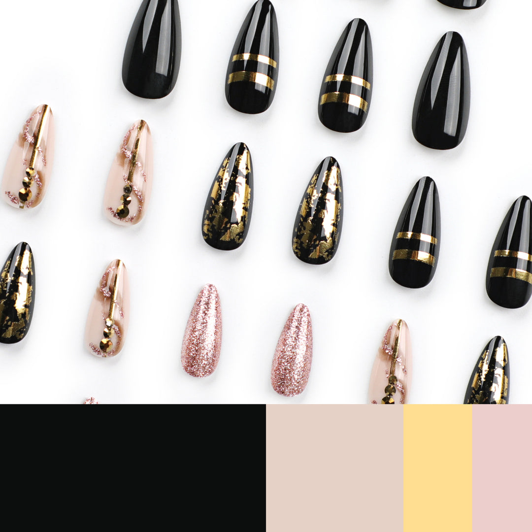 Glamouröse Stiletto-Nägel mit goldenen Akzenten Karnz