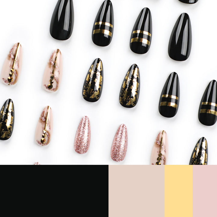 Glamouröse Stiletto-Nägel mit goldenen Akzenten Karnz