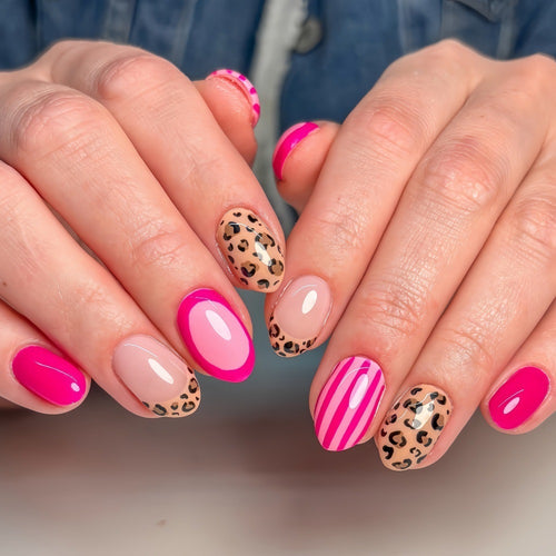 Kunstnägel mit trendigen Leopard- und Streifendekoren Karnz
