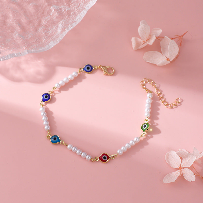 Perlen- und Farbige Böse Augen Armband Karnz