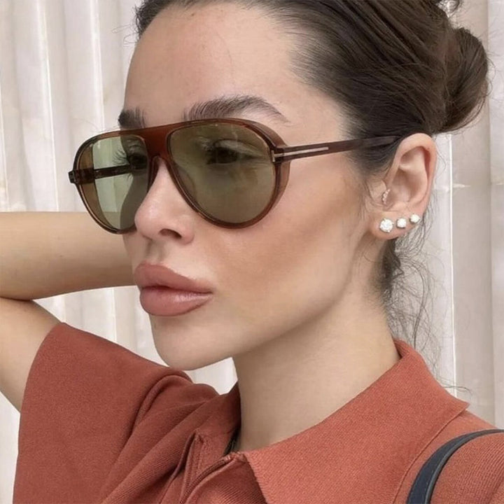 Damen stilvolle Sonnenbrille im aerodynamischen Design Karnz