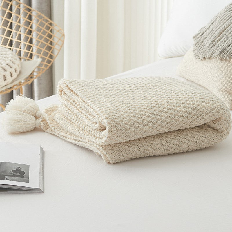 Strukturierte Strickwurfdecke