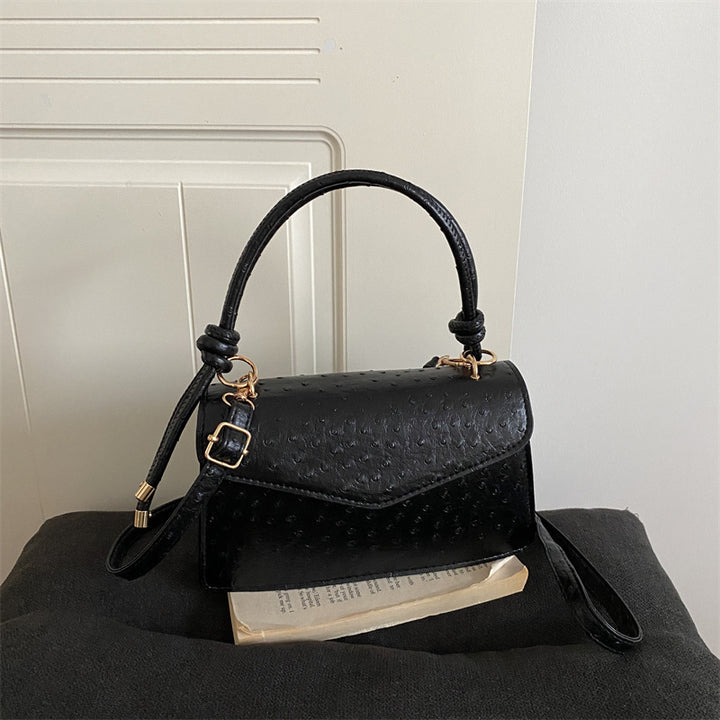 Strukturierte Lederhandtasche