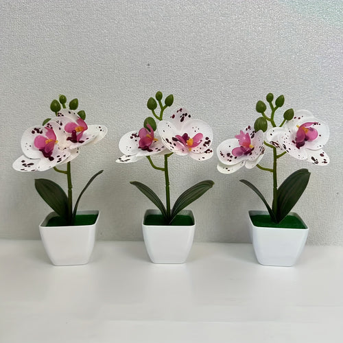 Dekorative künstliche Orchideenarrangement für die Wohnkultur展示