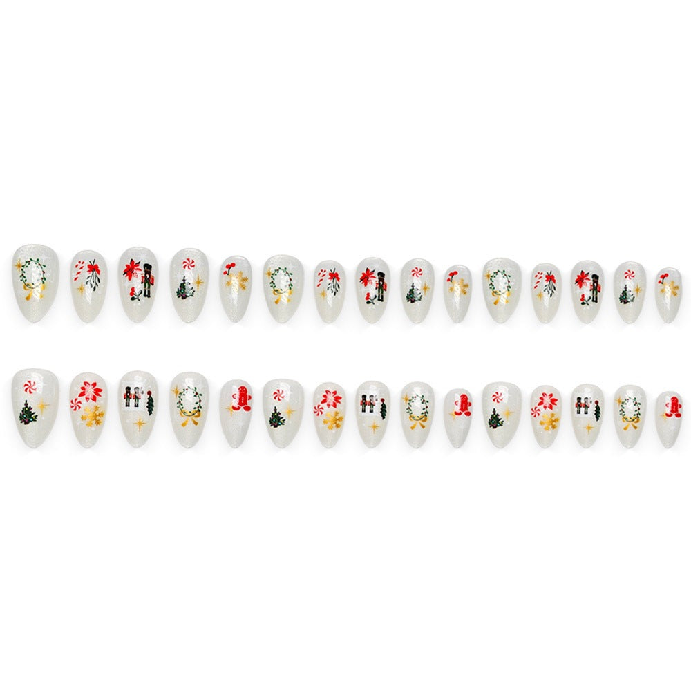 Kunstnägel mit festlichen Weihnachtsmotiven Karnz