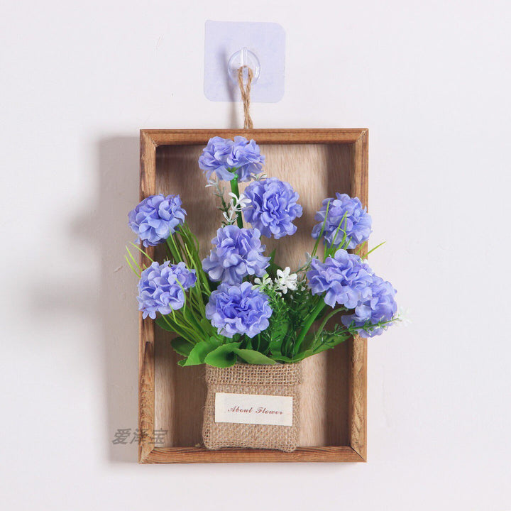 Wandmontierte dekorative florale hängende Pflanzgefäß