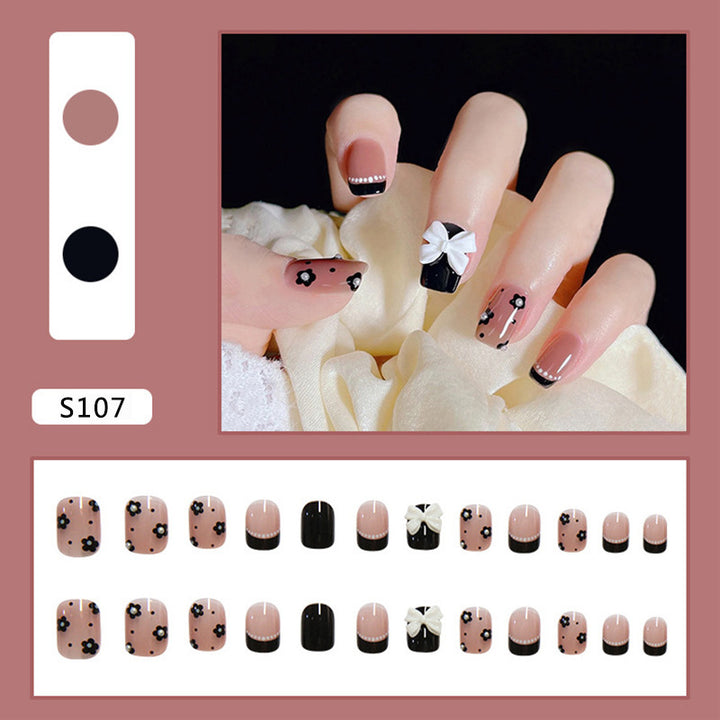 Kunstnagelset mit eleganter Schleifen- und Blumendekoration Karnz