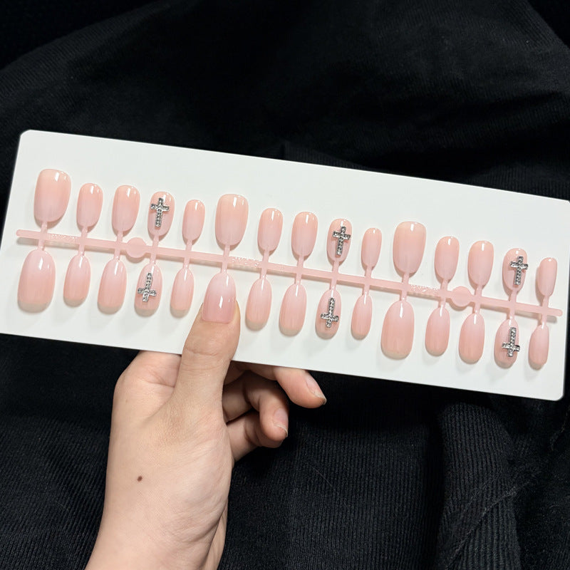 Elegante Press-On-Nagelkunst mit Kreuzdesign Karnz