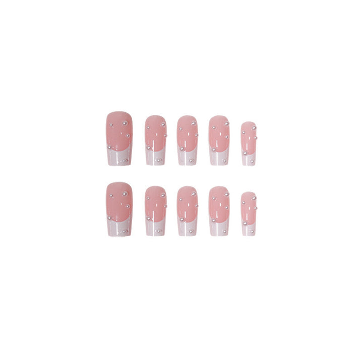 Kunstnagelset mit exquisiten Perlenakzenten und transparentem Design Karnz