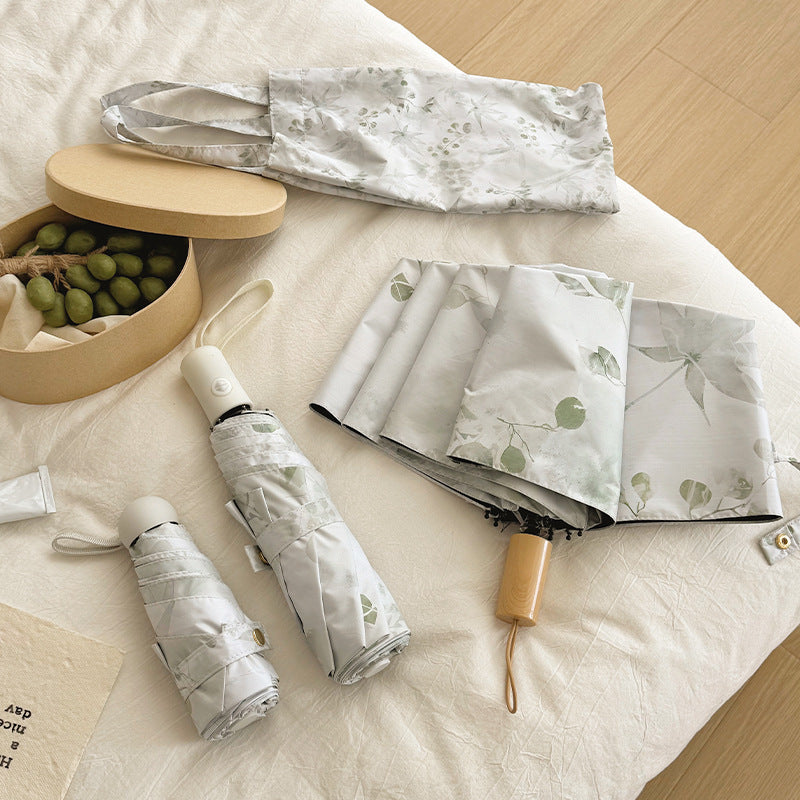 Damen Faltbarer Regenschirm mit elegantem botanischem Muster Karnz