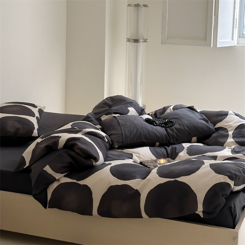 Gepunktete Bettwäschegarnitur aus Baumwoll‑Satin mit extra weichem Griff