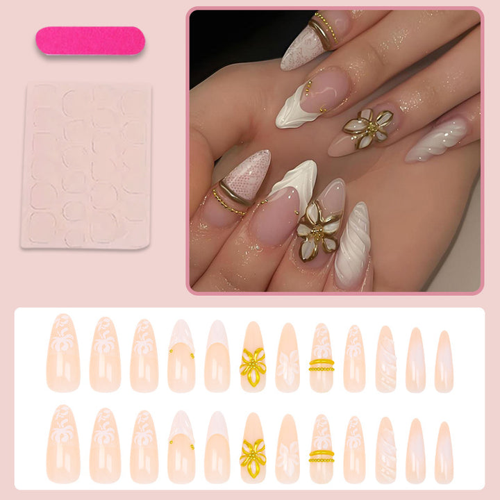 Kunstnagelset mit eleganten Blüten- und Glitzerdetails Karnz