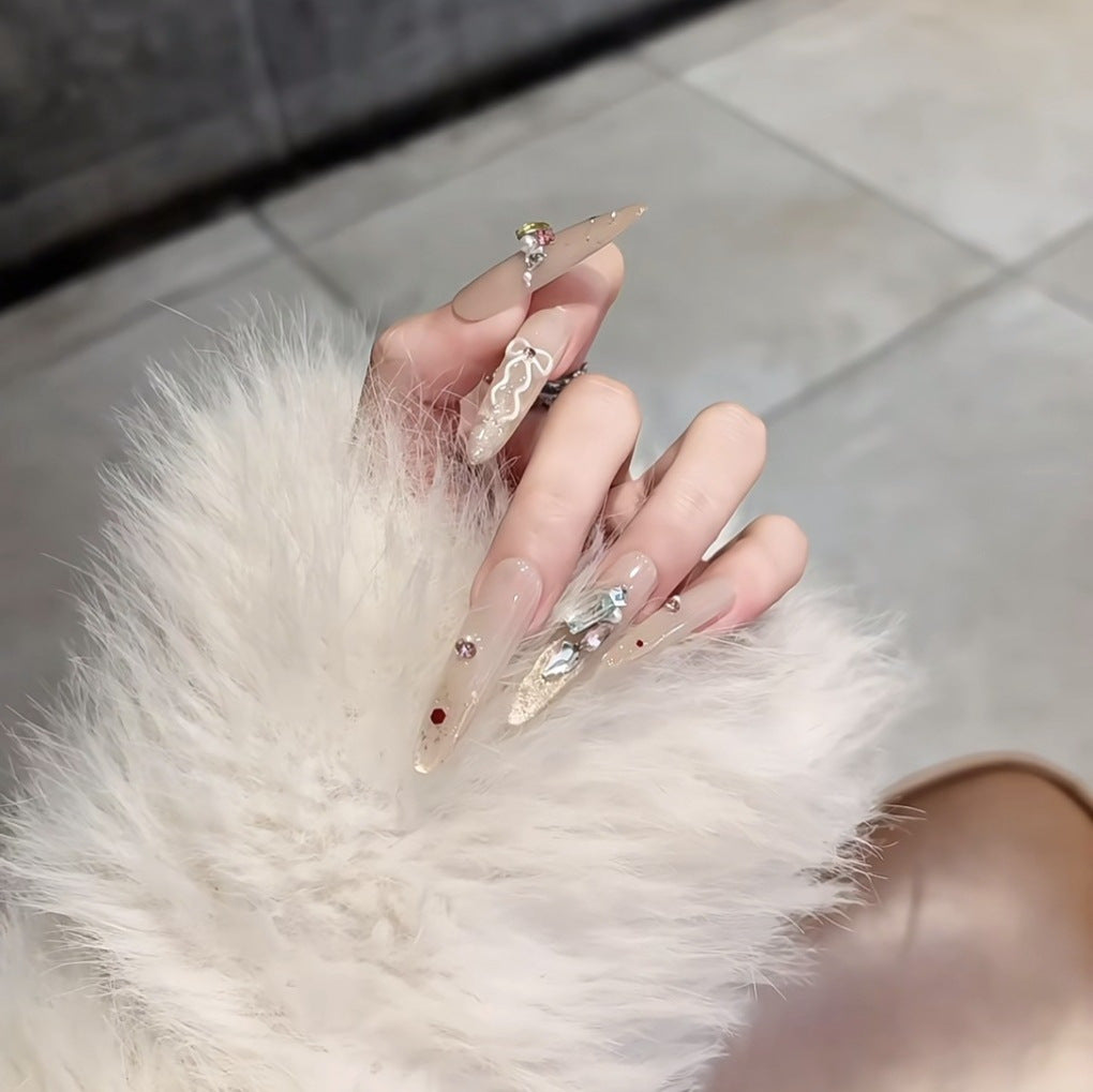 Künstlerische mit Kristallen verzierte Stiletto-Nagelerweiterungen
