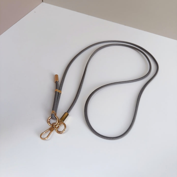 Verstellbares Multi-Use Lanyard mit dualen Clips Karnz