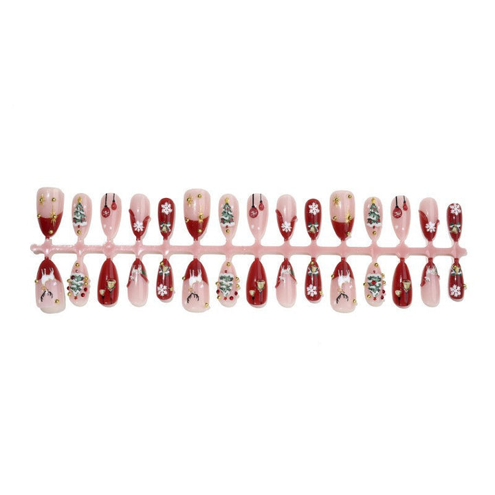 Kunstnagelset mit festlichen Motiven und Glitzerelementen Karnz