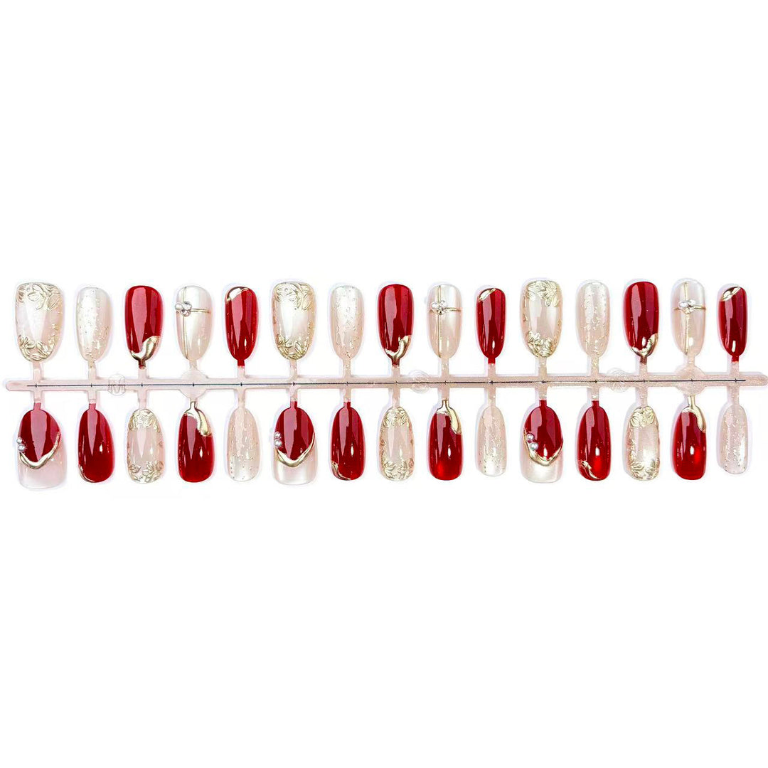 Kunstnagelset mit eleganten Blumen- und Glitzerakzenten Karnz