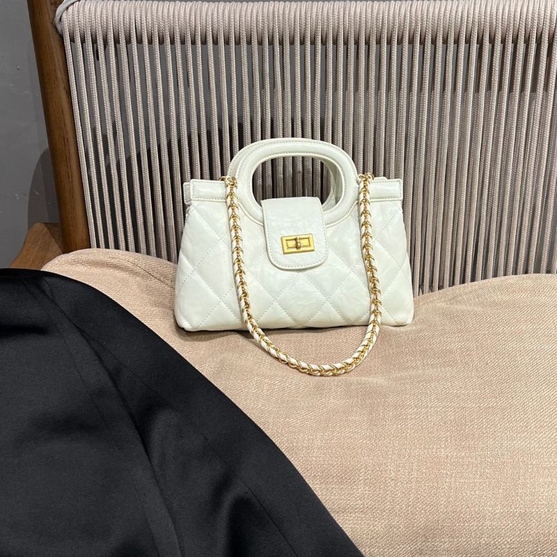 Gepolsterte elegante Handtasche Karnz
