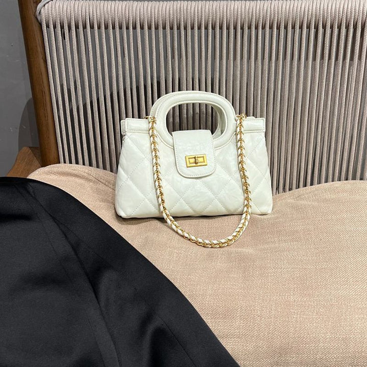 Gepolsterte elegante Handtasche Karnz