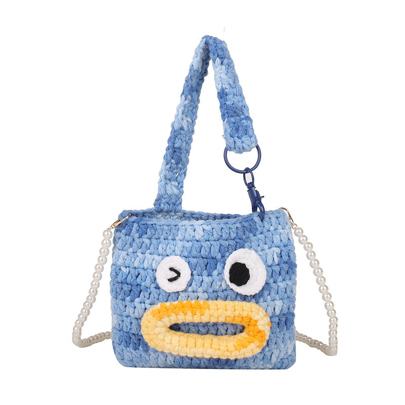 Niedliche gehäkelte Handtasche im Tierdesign