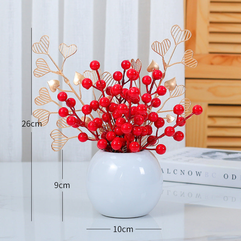 Herzförmige dekorative Blumenarrangement