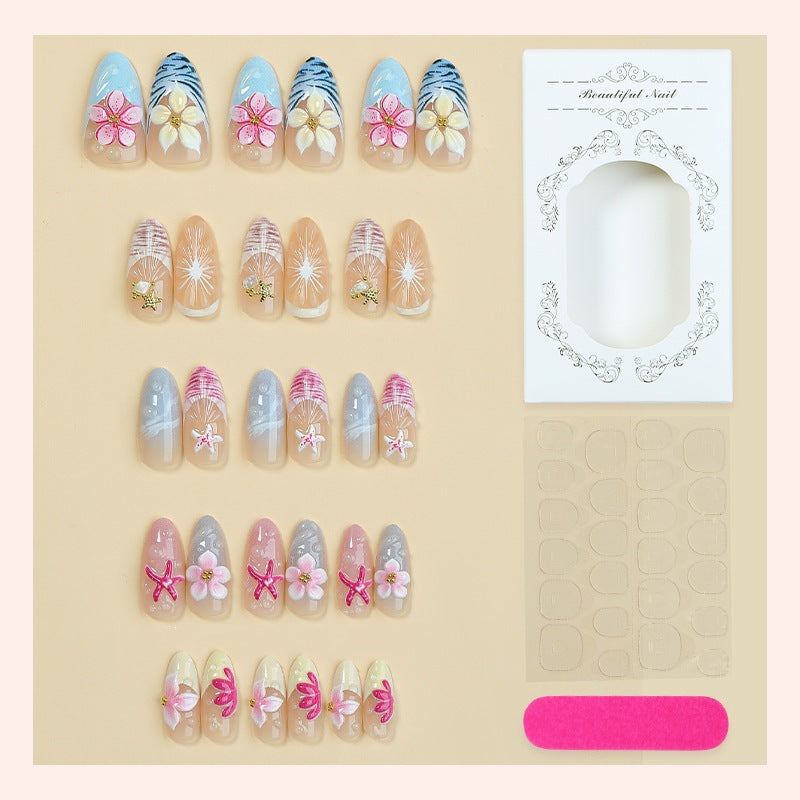 Kunstnagelset mit floralen Designs und eleganten Akzenten Karnz