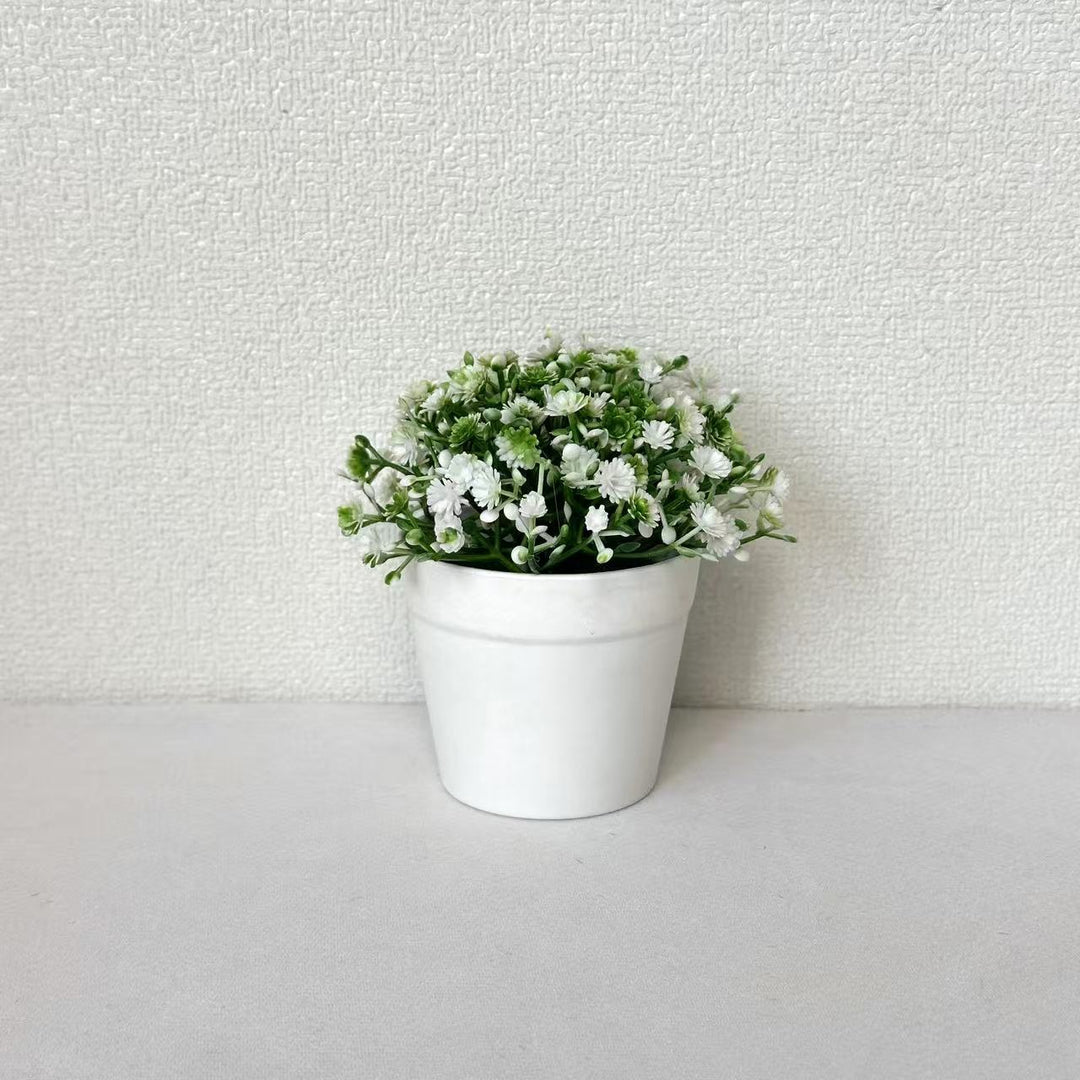 Miniatur Arrangement mit künstlichen Blumen im Topf