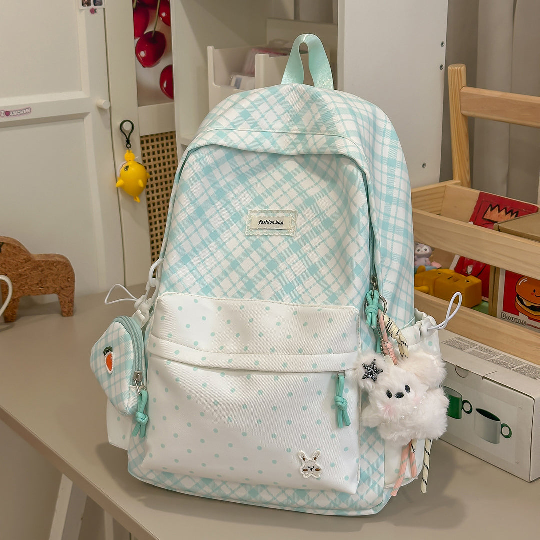 Stylische Karomuster-Rucksack mit lustigen dekorativen Akzenten Karnz