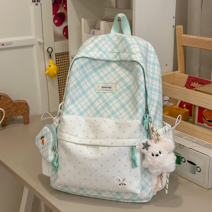 Stylische Karomuster-Rucksack mit lustigen dekorativen Akzenten Karnz