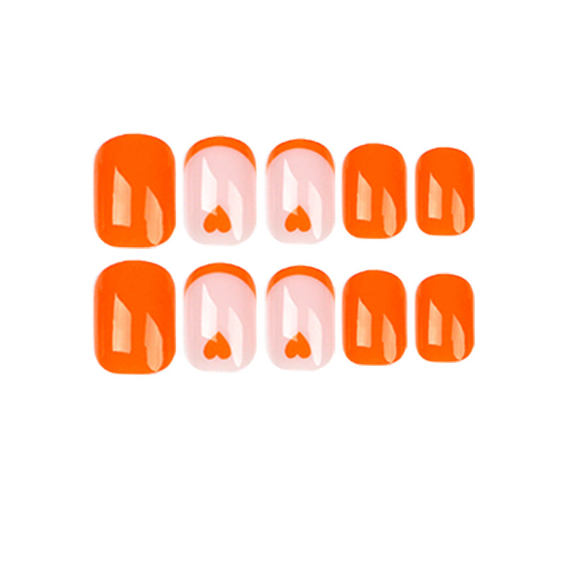 Kreative Nagelkunst mit Herzmotiven und Neonakzenten Karnz