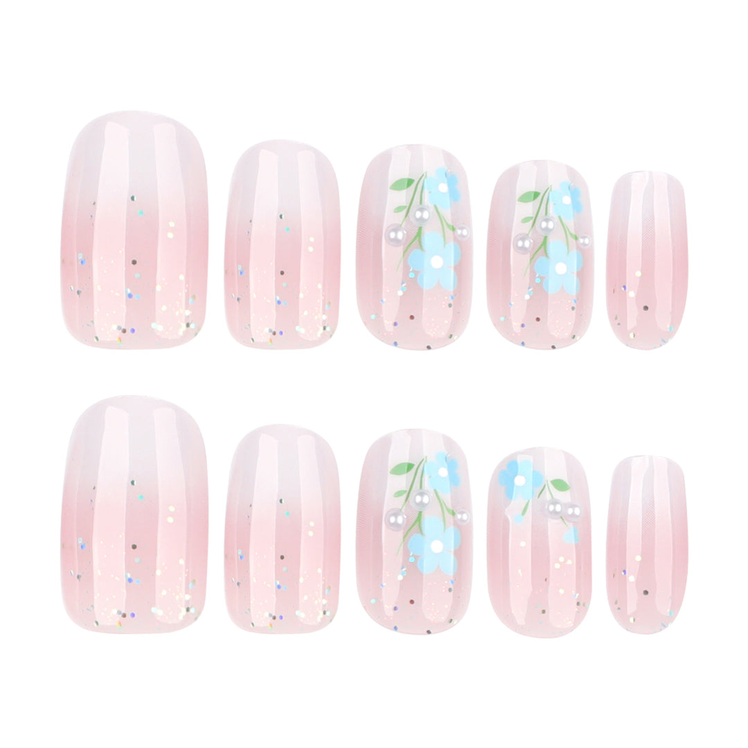 Kunstvolle Nagelverlängerungen mit blumigem Design Karnz