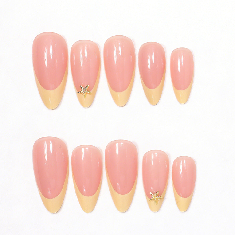 Elegante Stiletto-Nagelkunst-Tipps mit Seestern-Akzenten Karnz