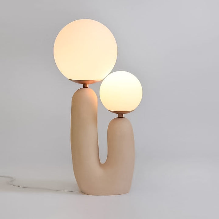Künstlerische Tischlampe mit dualem Globusdesign