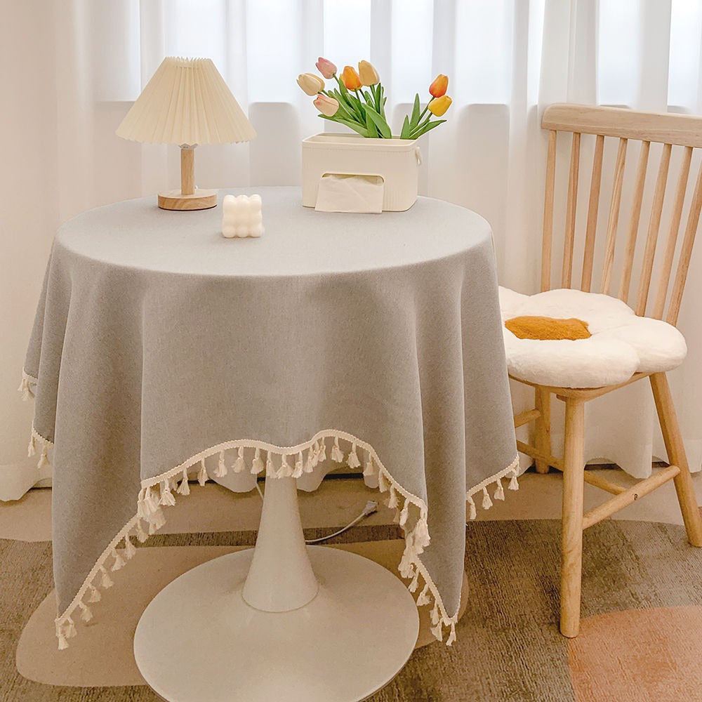 Runde strukturierte Tischdecke mit Quastenbesatz und Leinen-ähnlichem Drapierfinish