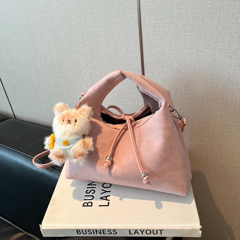 Stylische und funktionale Drawstring-Handtasche Karnz