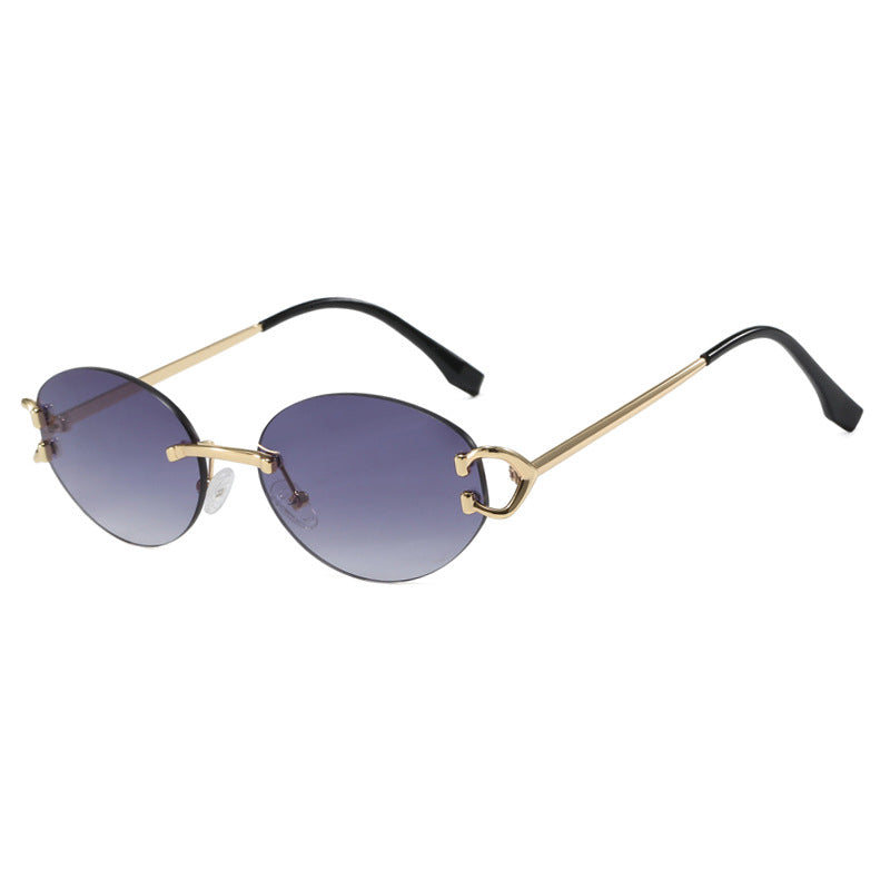 Damen elegante ovalförmige Sonnenbrille mit modischem Metallrahmen Karnz