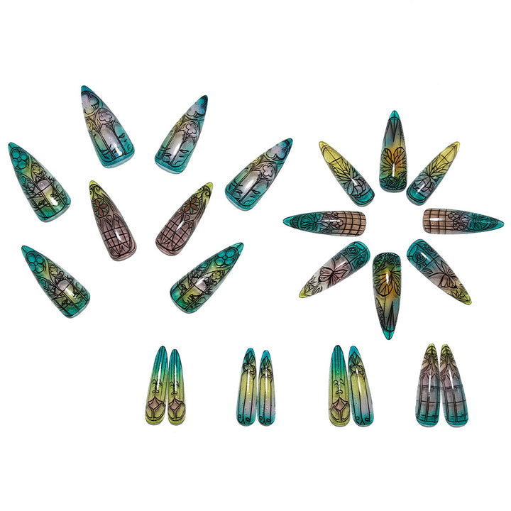 Kunstnägel Im Eleganten Stiletto-Design mit Kunstvollen Motiven Karnz