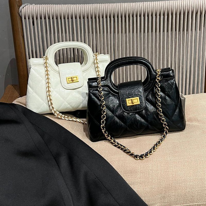 Gepolsterte elegante Handtasche Karnz