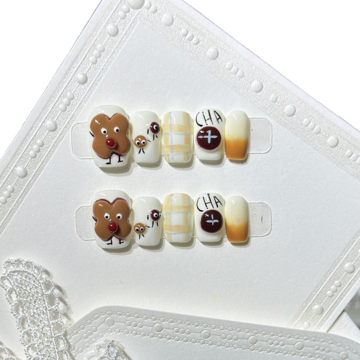 Verspieltes Lebkuchen Press-On Nagelkunst Set Karnz