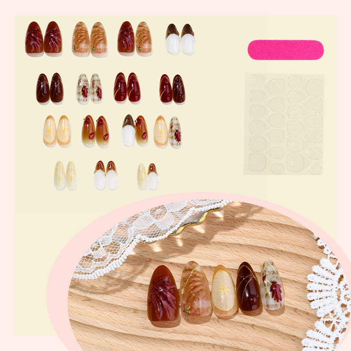 Premium dekorative Press-On Nagelset mit künstlerischen floralem Akzenten Karnz